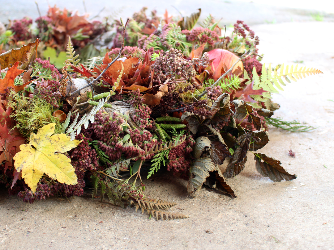 A naturally textured fall wreath foraged from wildflowers and plants.