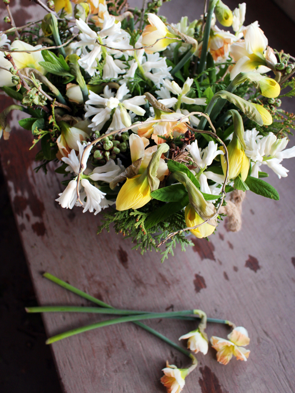 Learn how to do flower arranging with daffodils and mixes of other flowers
