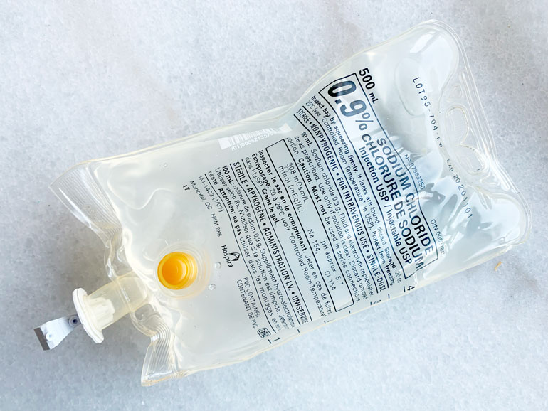 A plastic baggie of saline.